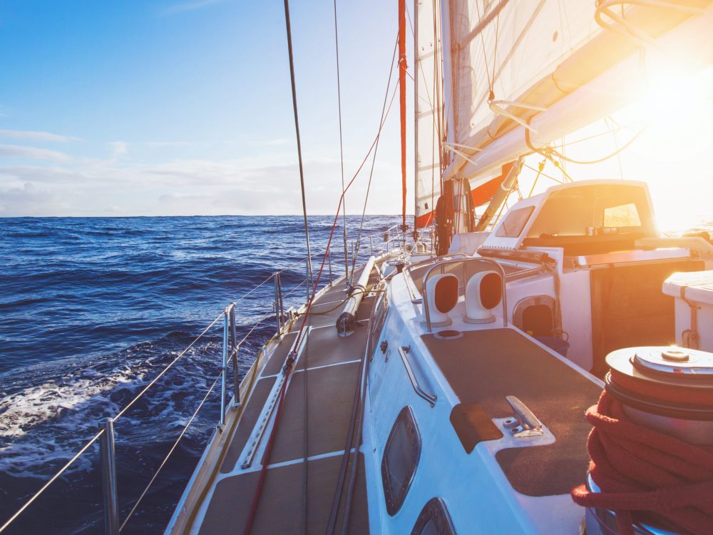 Luxury,Sailboat,Sailing,In,Sunset,Sea,,Yacht,Cruise