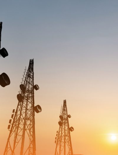 Silhouette,,Telecommunication,Towers,With,Tv,Antennas,And,Satellite,Dish,In